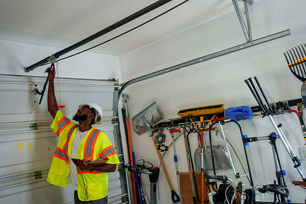 Professional Garage Door Installation technician working in Gang Mills, NY